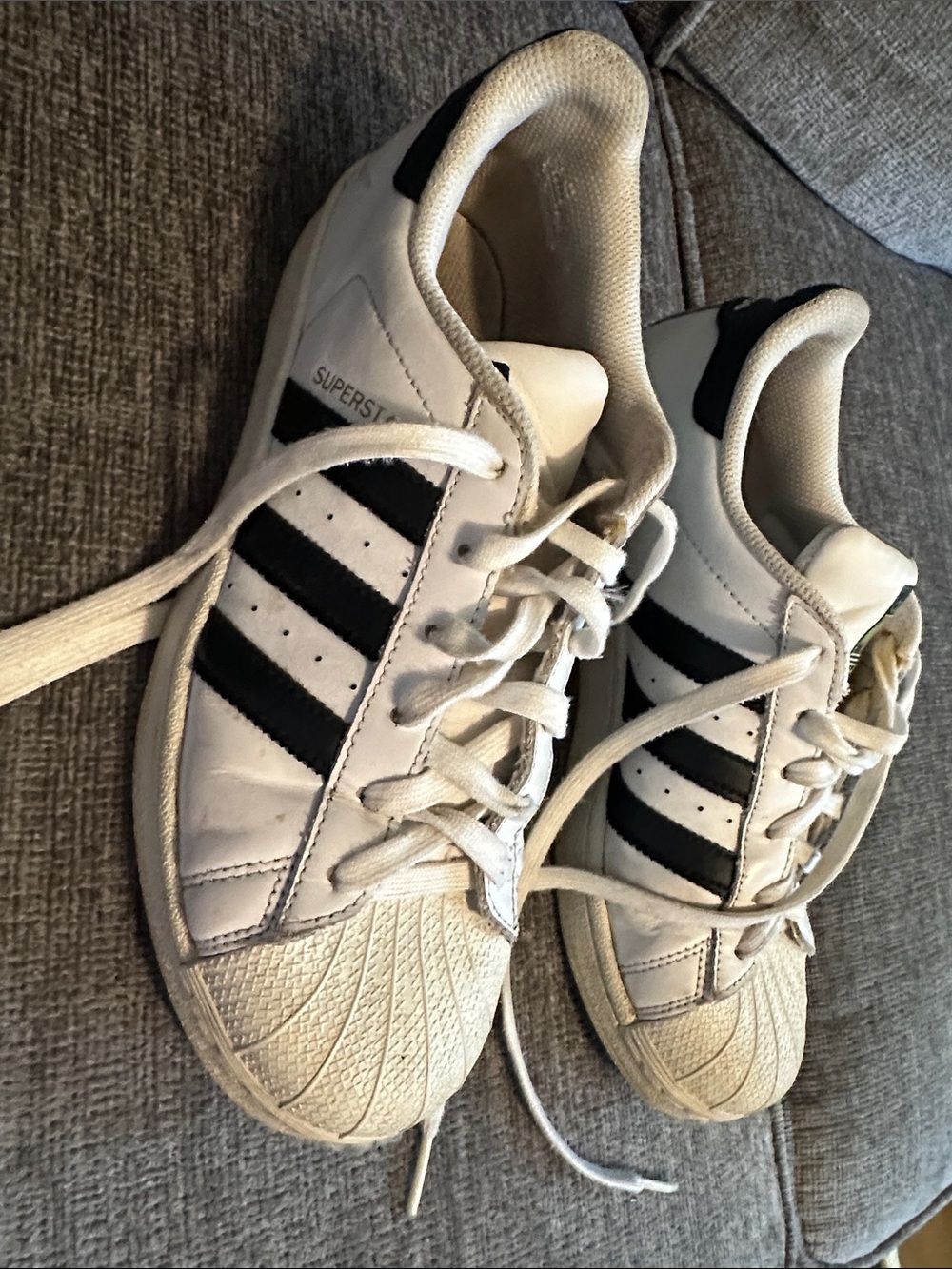 adidas women’s White & Black Superstar Sneakers with Shell Toe